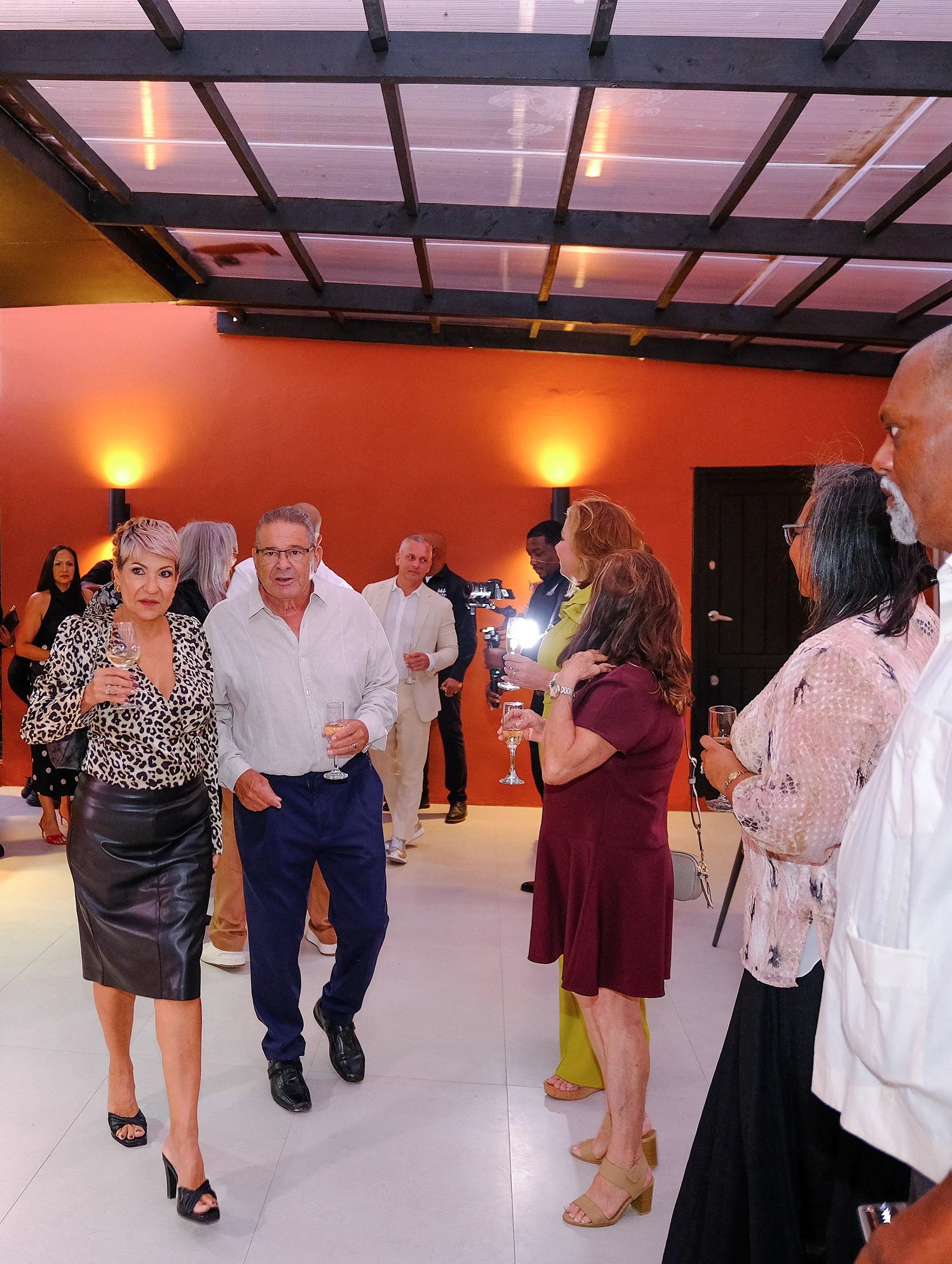 Guests enjoying drinks at an evening event