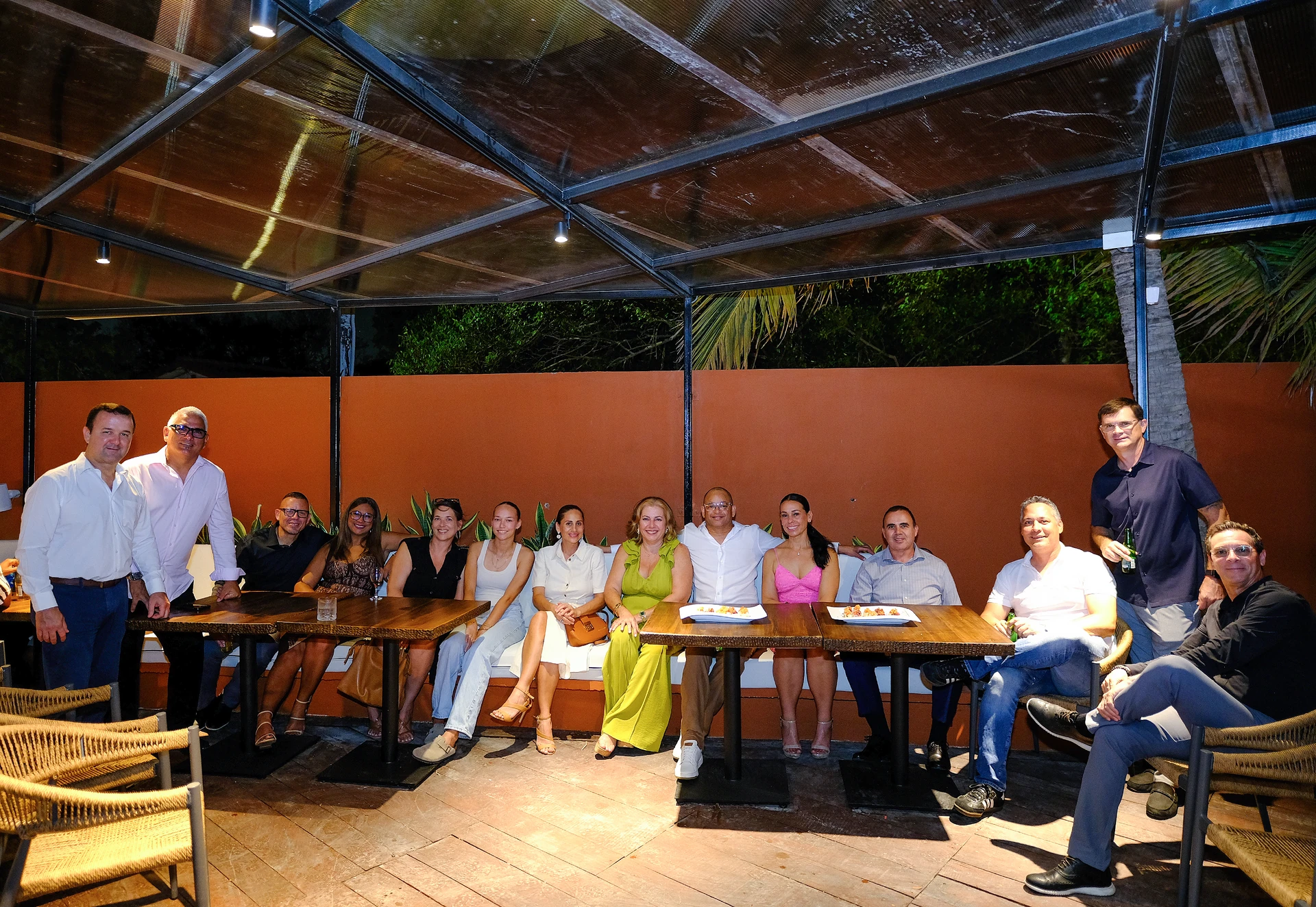 Large group dinner on a covered terrace